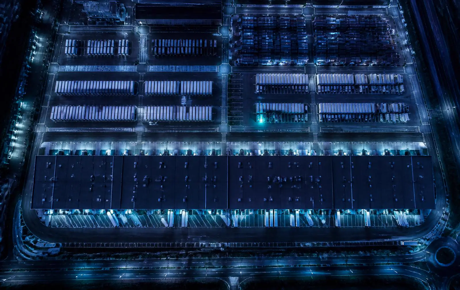 Aerial view of a European logistics hub at night